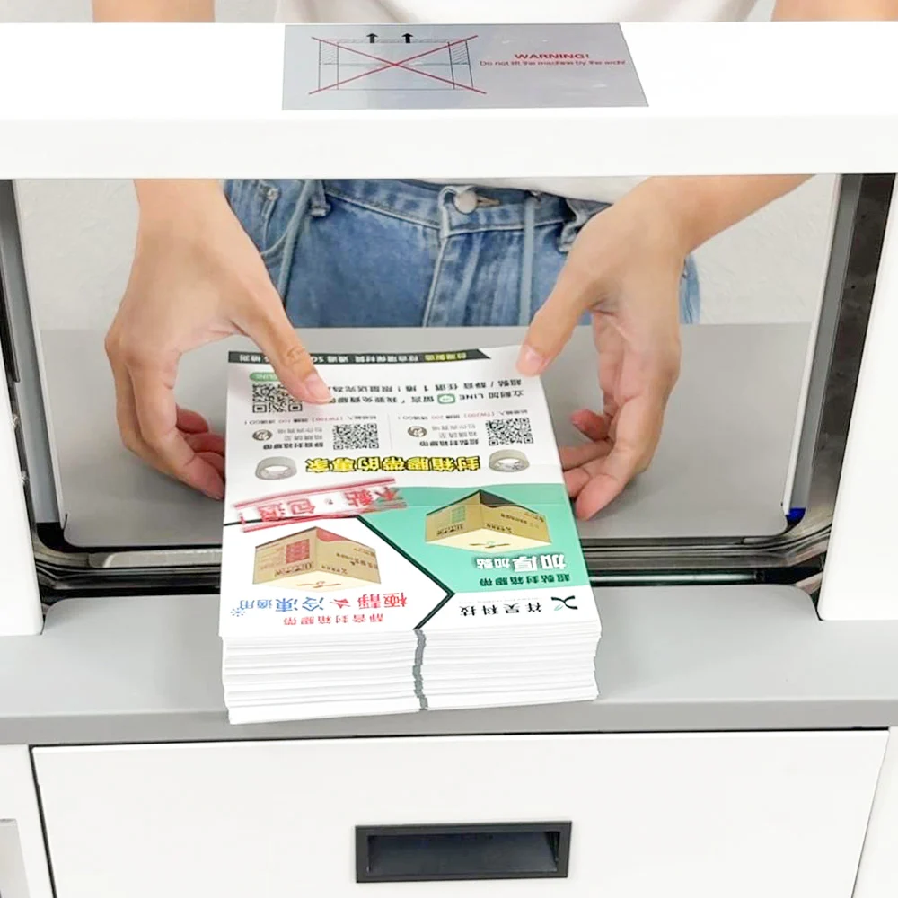 桌上型自動束帶機使用紙帶綁束印刷品示意