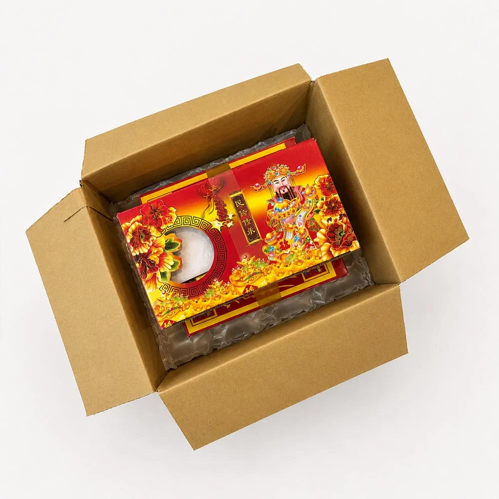 中元香品使用束帶機整裝後搭配氣泡布裝箱防護 2