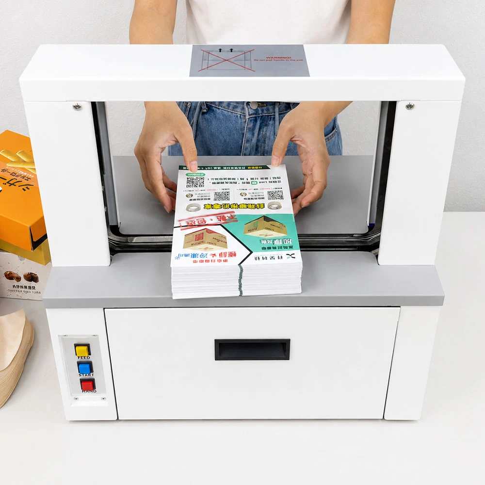 桌上型自動束帶機進行印刷品集束包裝